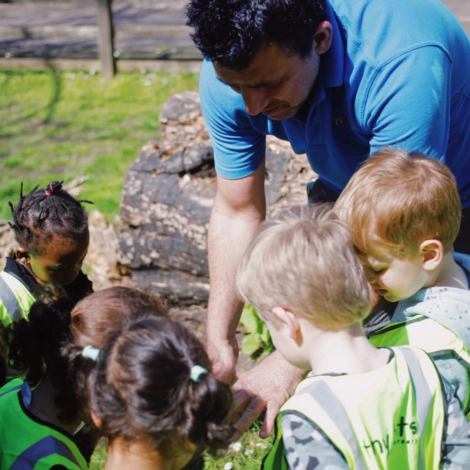 Children enjoying activities at Tiny Tots Nursery